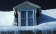 Hoe helder sneeuw & ijs uit een hoog dak