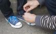 Hoe vlecht de veters van de schoen