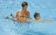 Hoe te leren een kind de borstcrawl zwemmen beroerte