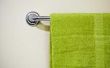 Hoe ordenen van uw huis met behulp van handdoekrekken