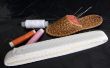 Hoe maak je een elastische broekband zonder een behuizing