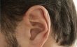 Hoe te doen van de munt achter het oor truc