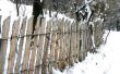 Hoe te repareren van een houten hek