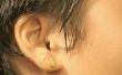 Bepalen van de oren direct na de eerste Piercing