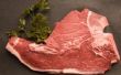 Testen voor Doneness in zeer dikke gegrild varkensvlees Loin koteletten