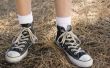 Hoe krijg ik een bleekmiddel vlek uit Converse schoenen