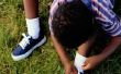 Hoe om een kind te binden schoenen te leren