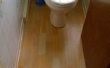 Hoe te leggen laminaatvloer rond een Toilet