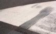 Hoe te repareren van een asfalt oprit inspringing