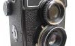 Hoe u een riem koppelt aan een Nikon Camera