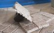 Het lijmen van mozaïek tegels beton bestratingsafwerkmachines