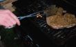Hoe schoon een verstopte propaan slang op een draagbare BBQ-Grill