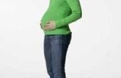 Hoe te dragen gewone Jeans tijdens de zwangerschap