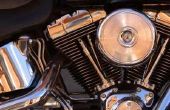 Het wijzigen van de drie compartimenten van de olie op de motorfiets van Harley Davidson Twin Cam