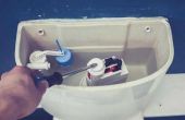 Hoe te repareren van een overloop in een Tank van het Toilet