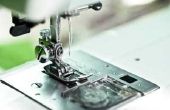 Wat Is een automatische naald Threader op een naaimachine?