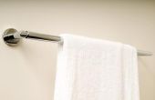 De hoogte van een badkamer handdoekrek