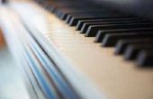 Hoe te Refinish een Piano met fineer hout