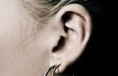Hoe te behandelen een besmette oor piercing
