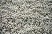 Hoe plooi tapijt naast tegel