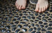 Hoe schoon een Pebble douche vloer