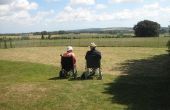 Oefeningen voor de ouderen beperkt tot rolstoelgebruikers