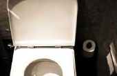 Hoe te verwijderen van roest van de binnenkant van de Tank van een Toilet