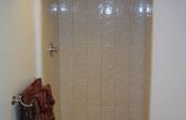 Hoe vervang ik de tegels van de vloer van de douche