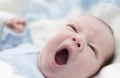 Hoe kan ik opruimen van mijn pasgeboren baby's mond?