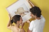 Hoe te berekenen van de juiste hoogte voor het ophangen van foto's op uw muur