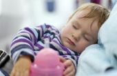 Hoe krijg ik een Baby te slapen op een vliegtuig