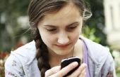 Nadelen van tieners met behulp van mobiele telefoons van de cel