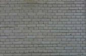 Wat doen horizontaal scheuren in een bakstenen muur van een nieuw huis met een gemiddelde Post spanning Slab?