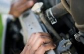 Wat onderdelen zijn nodig bij de wederopbouw van de motor van een auto?