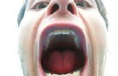 Oorzaken van grote bulten op de achterkant van een tong
