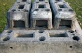 Hoe maak je verhoogd bedden met elkaar grijpende betonblokken