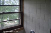 Het installeren van een bad en douche rond bestaande venster