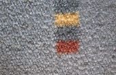 Siliconen glijmiddel uit tapijt verwijderen