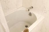 Hoe te repareren van een afvoer bad met een handvat die u omlaag duwt
