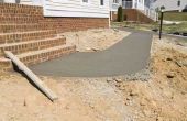 Hoe installeer ik een betonnen trottoir