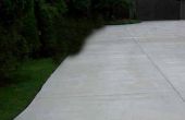 Wat is de dikte van een betonnen oprit?